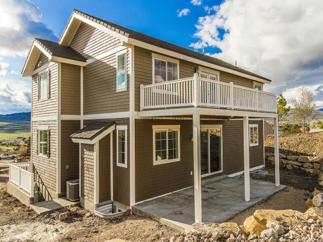 Two-story home with deck